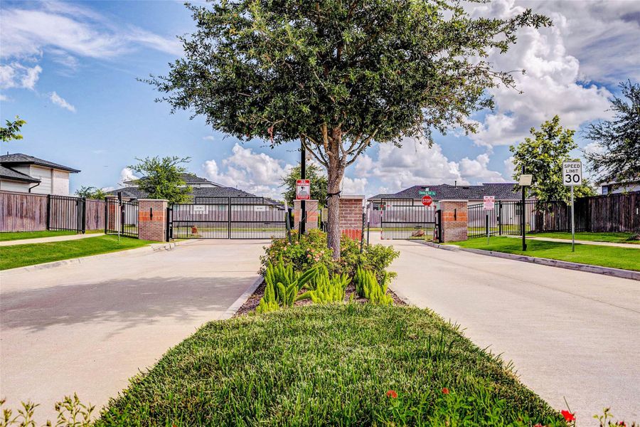 Security meets charm at the gated entrance of this inviting neighborhood, where lush landscaping, mature trees, and clean brickwork frame a peaceful, protected community. Controlled access adds peace of mind while elevating the curb appeal from the moment you arrive, offering a warm welcome home, every time. Security meets charm at the gated entrance of this inviting neighborhood, where lush landscaping, mature trees, and clean brickwork frame a peaceful, protected community. Controlled access adds peace of mind while elevating the curb appeal from the moment you arrive, offering a warm welcome home, every time.