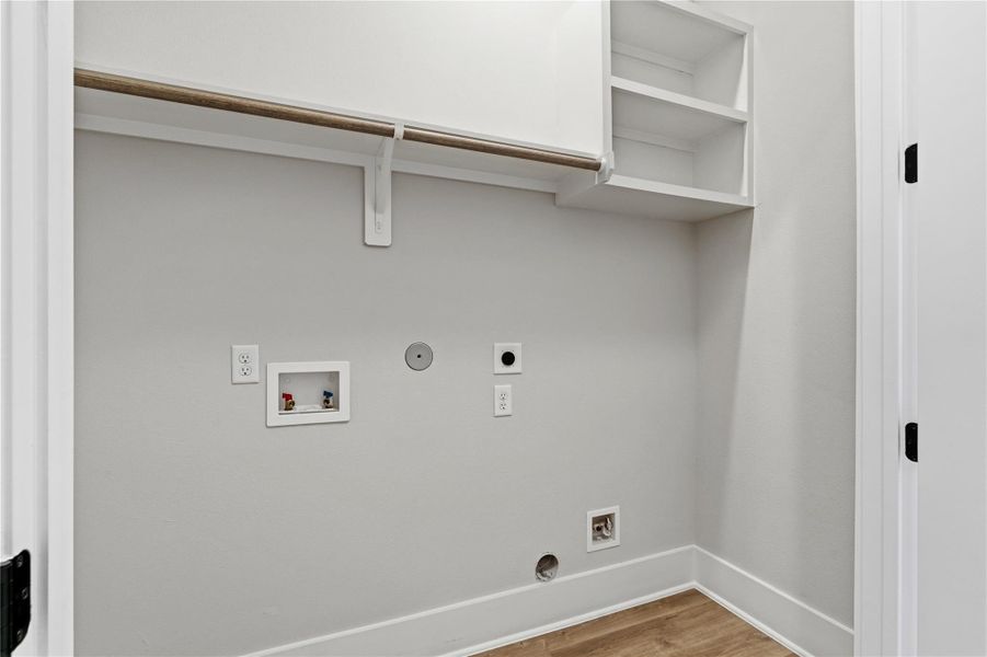 A practical laundry space with room to accommodate storage and streamline daily routines. A practical laundry space with room to accommodate storage and streamline daily routines.