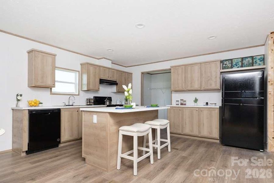 Furnished interior view inside a new home in , Newton (Image 9).