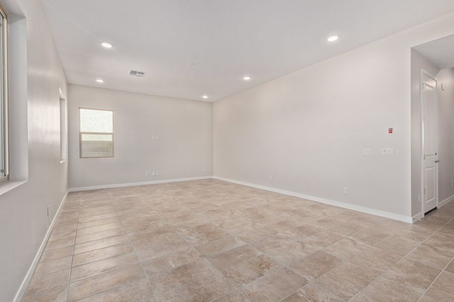 Spacious, unfurnished interior of a new home in Wildera, Queen Creek (Image 8).