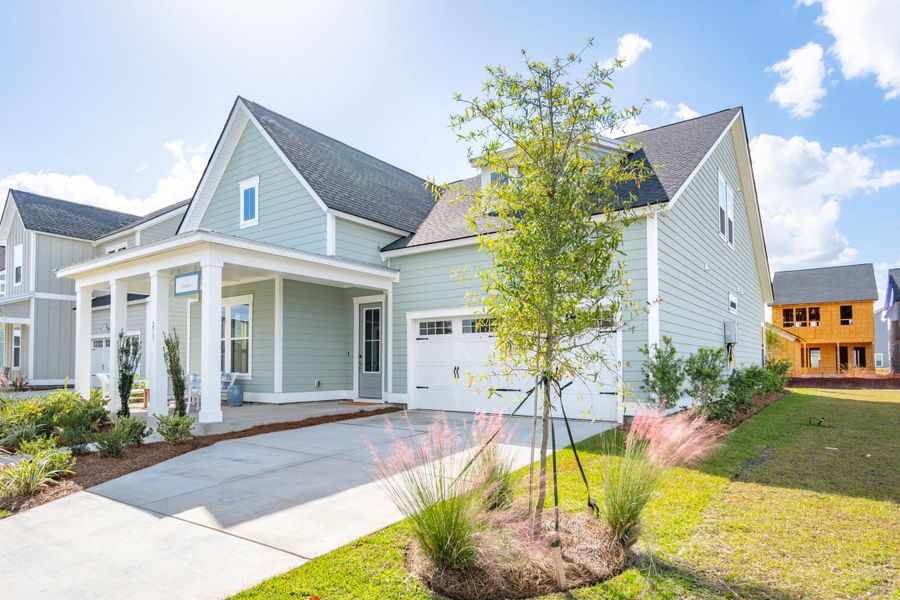 Front exterior of a new home in Carnes Crossroads, Summerville, SC, highlighting curb appeal (Image 2).