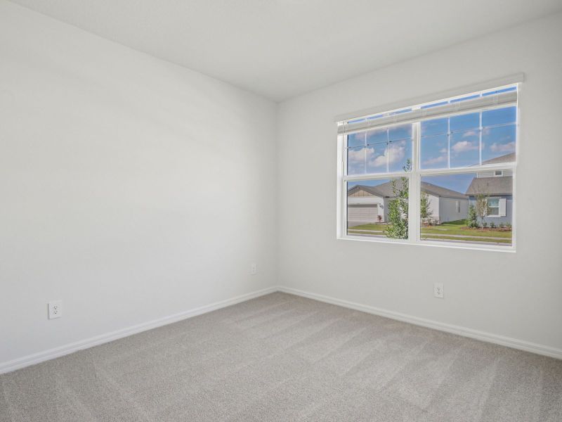 Spacious, unfurnished interior of a new home in Coasterra - Reserve Series, Palmetto (Image 15).