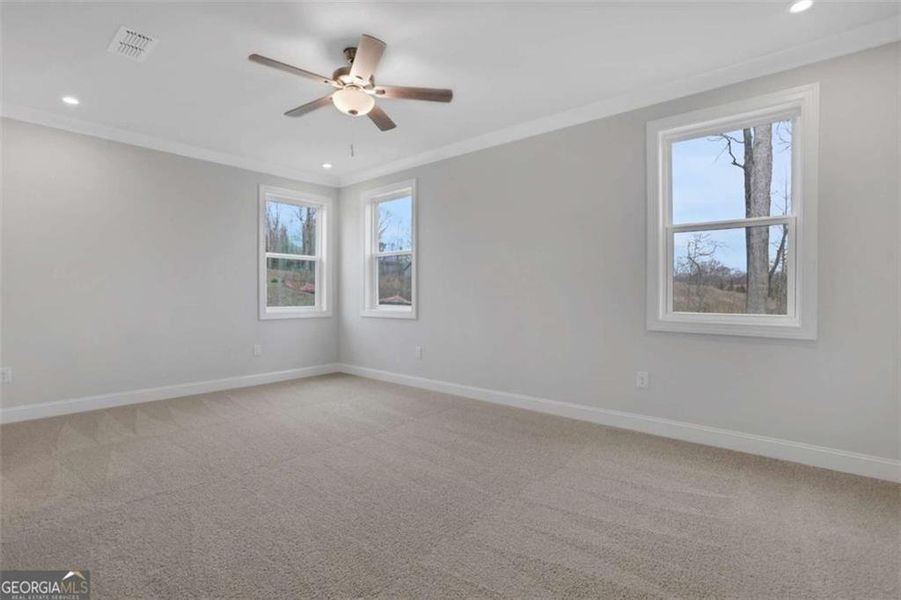 Spacious, unfurnished interior of a new home in The Paddocks at Doc Hughes, Buford (Image 25).