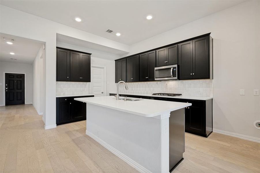 Furnished interior view inside a new home in The Villages of Hurricane Creek, Anna (Image 9).