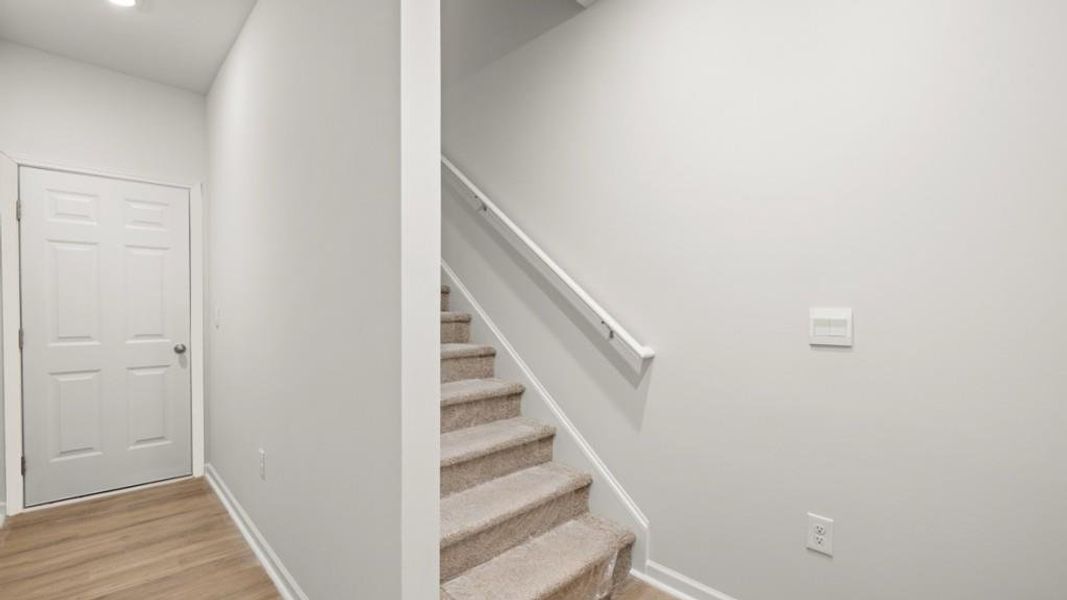 Spacious, unfurnished interior of a new home in Waypoint, Flowery Branch (Image 14).