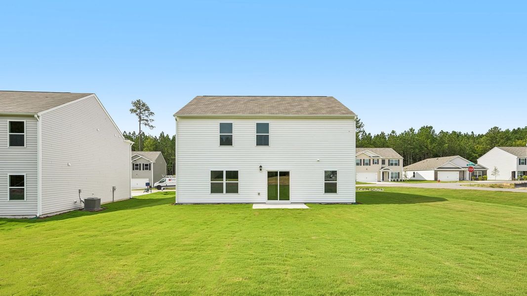 Exterior details and patio area of a home in Mangum Farms, Stem (Image 4).