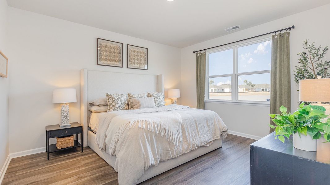 Furnished interior view inside a new home in Stanbury Creek, Supply (Image 8).