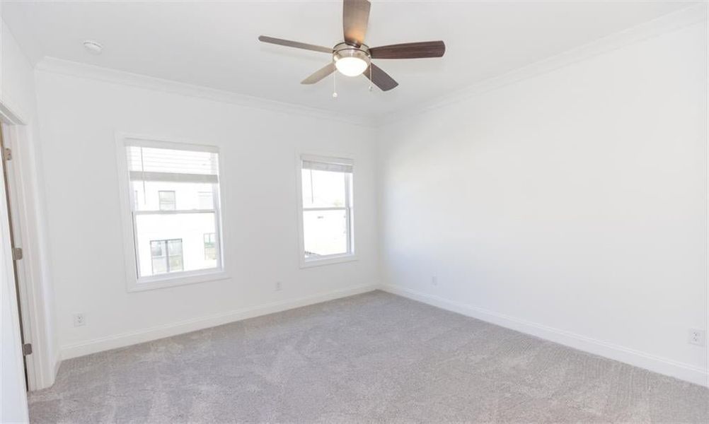 Secondary upstairs bedroom with private bath. Photo for representation purposes only, not of actual home but a  previously built TPG home.