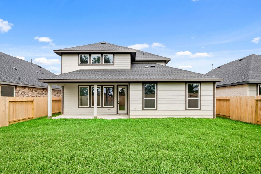 Exterior details and patio area of a home in Mill Creek Estates, Magnolia (Image 3).