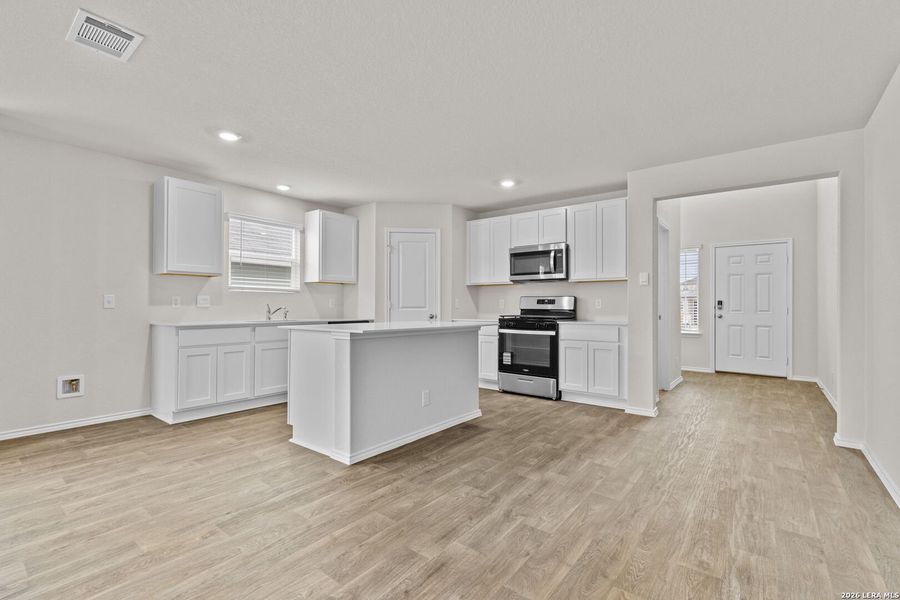 Furnished interior view inside a new home in Redbird Ranch, San Antonio (Image 7).