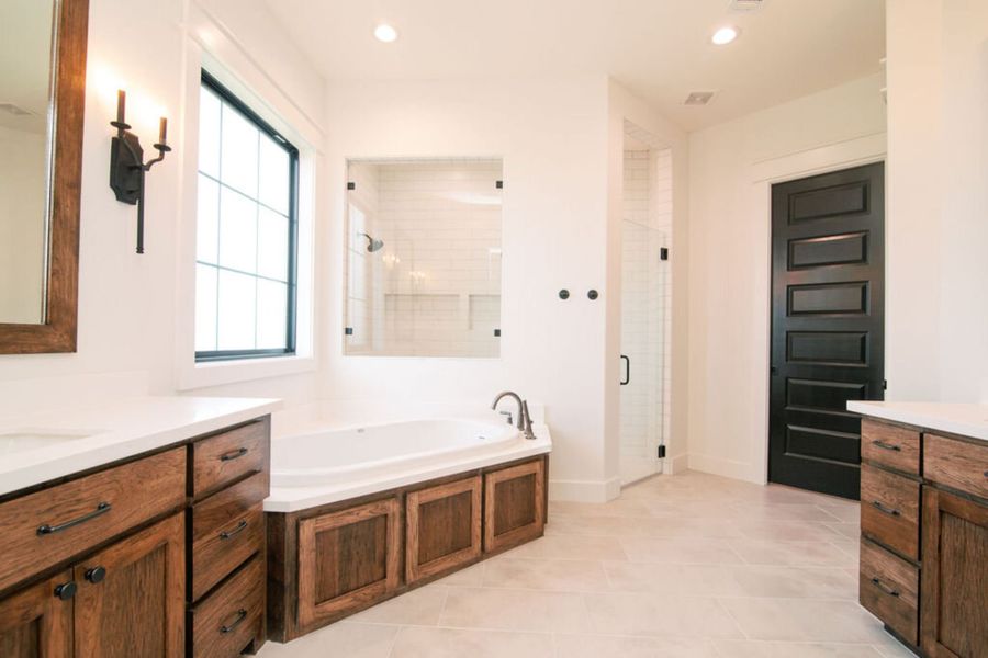 Representative furnished interior of a home built from the The Julia by Reece Homes in Pebble Creek, College Station (Image 45).