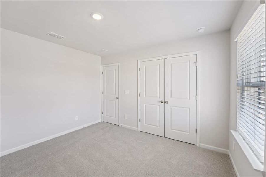 Spacious, unfurnished interior of a new home in Creekside at Oxford Park, Fairburn (Image 46).
