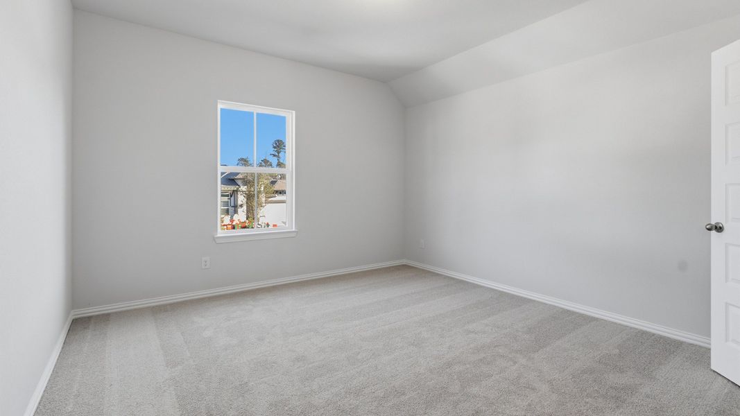 Furnished interior view inside a new home in The Woodlands Hills, Willis (Image 29).