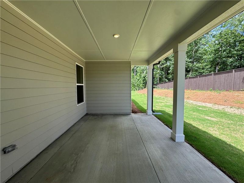 Exterior details and patio area of a home in Rosewood Lake Preserve, Hoschton (Image 17).