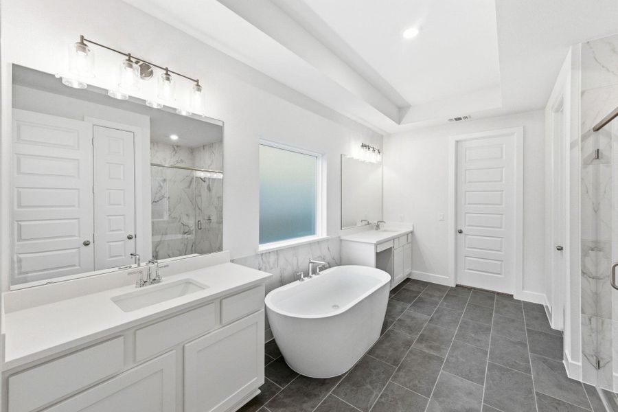 Furnished interior view inside a new home in The Colony, Bastrop (Image 11).