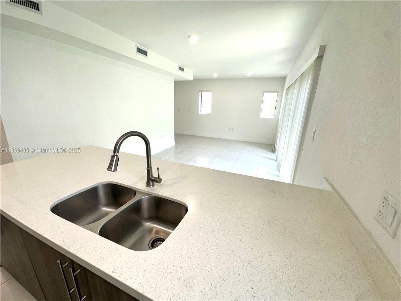 Furnished interior view inside a new home in , Florida City (Image 8).
