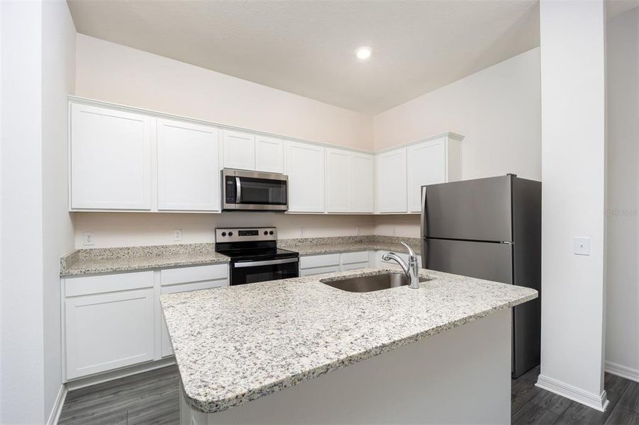 Furnished interior view inside a new home in Sol Vista, Dundee (Image 5).