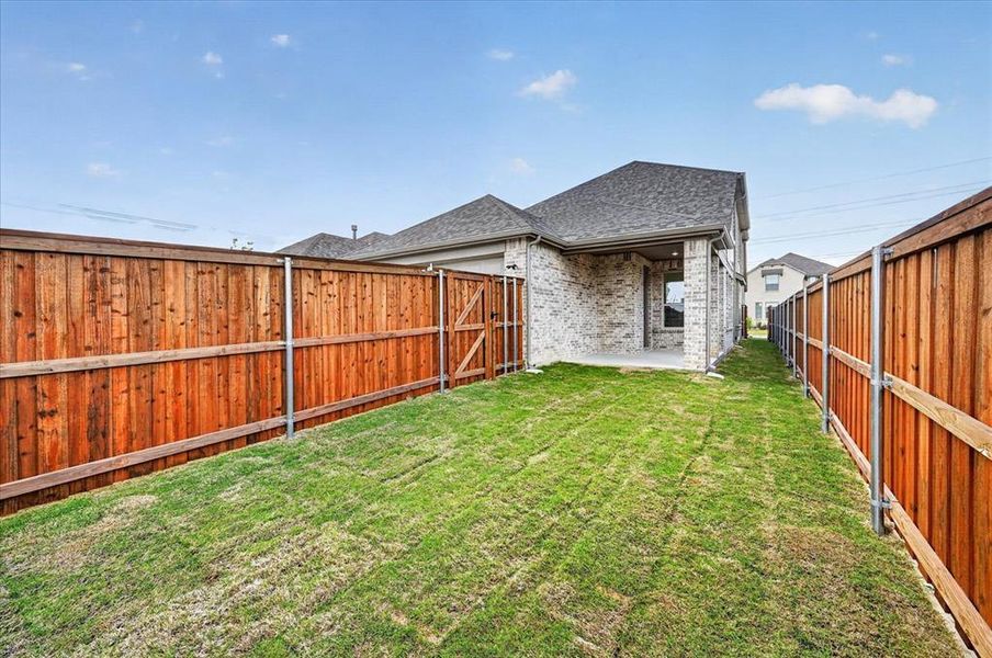 Exterior details and patio area of a home in Wellington, Haslet (Image 3).