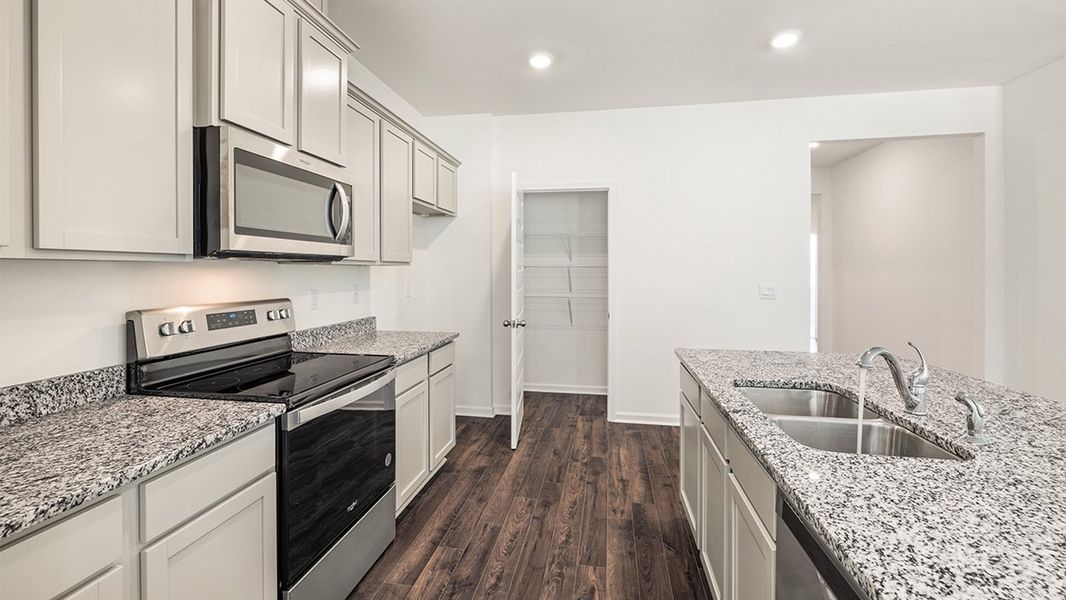 Representative furnished interior of a home built from the Aria by D.R. Horton in The Preserve at Agricultural Village, Perry (Image 7). Representative furnished interior of a home built from the Aria by D.R. Horton in The Preserve at Agricultural Village, Perry (Image 7).