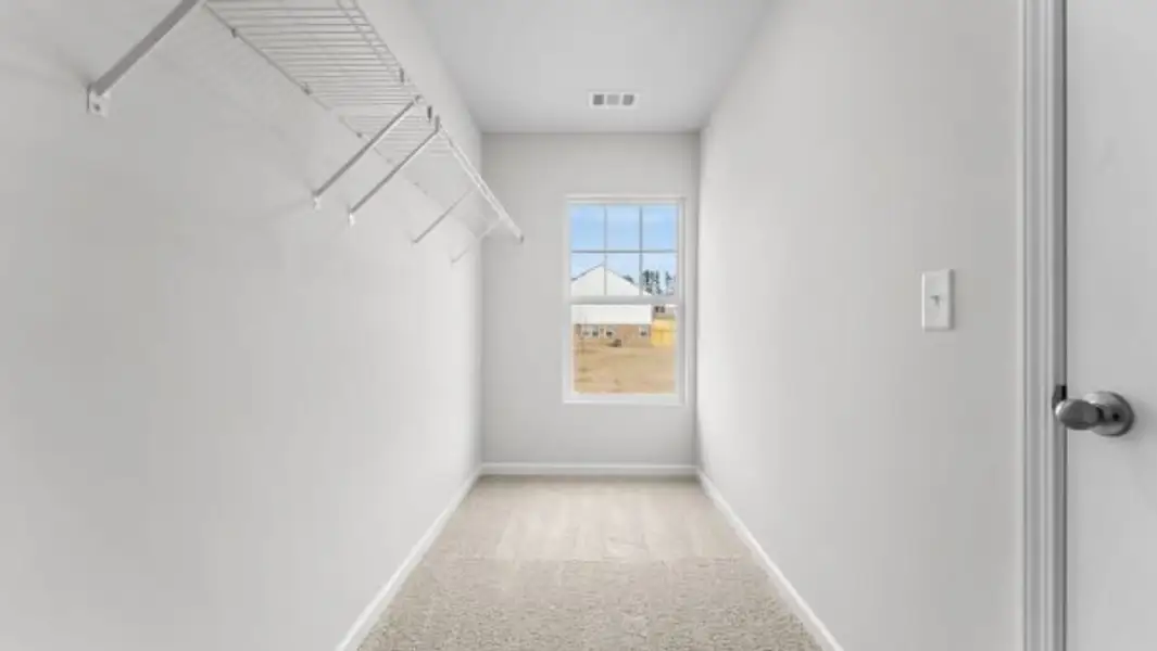 Representative unfurnished interior of a home built from the Bramblewood Townhome by Piedmont Residential in The Retreat at Browns Ridge, Newnan (Image 22).
