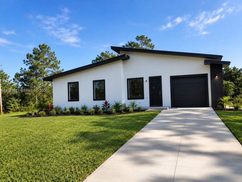 Front exterior of a new home in , Lehigh Acres, FL, highlighting curb appeal (Image 1). Front exterior of a new home in , Lehigh Acres, FL, highlighting curb appeal (Image 1).