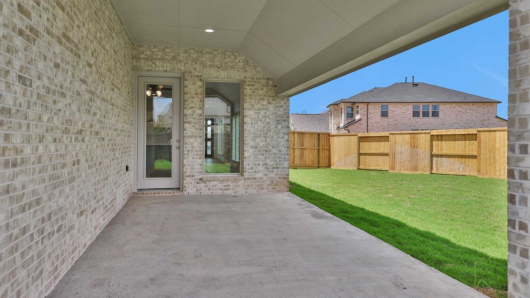 Representative exterior details of a home built from the 2263W by Perry Homes in Veramendi, New Braunfels (Image 3).