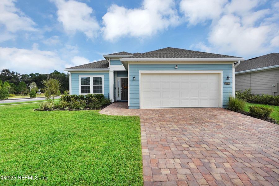 Front exterior of a new home in , Jacksonville, FL, highlighting curb appeal (Image 25).