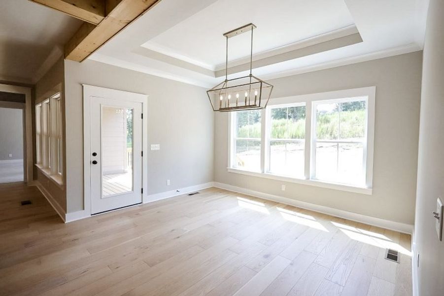 Spacious, unfurnished interior of a new home in Baker Road, Birchwood (Image 60).
