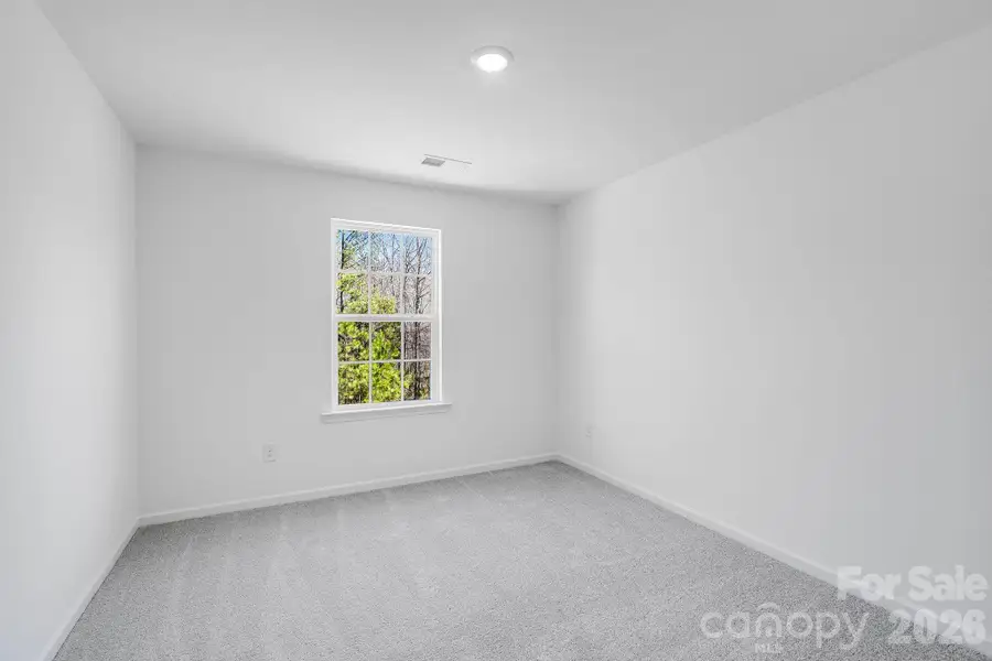 Spacious, unfurnished interior of a new home in Cannon Village, York (Image 8).