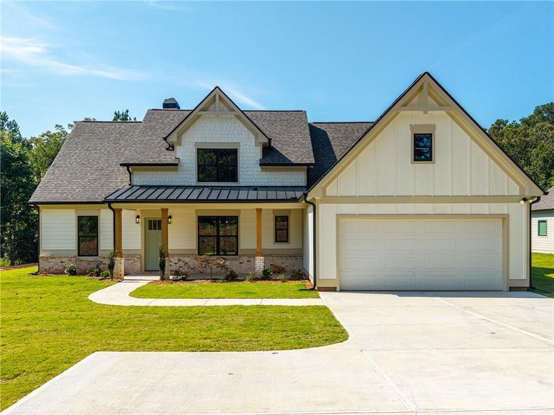 Front exterior of a new home in , Ellijay, GA, highlighting curb appeal (Image 2). Front exterior of a new home in , Ellijay, GA, highlighting curb appeal (Image 2).