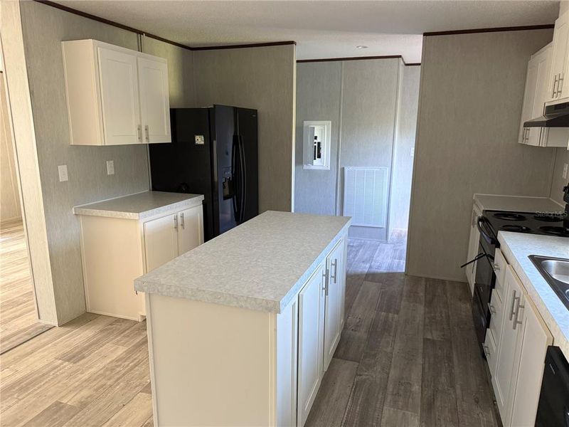 Furnished interior view inside a new home in , Lake Wales (Image 2).