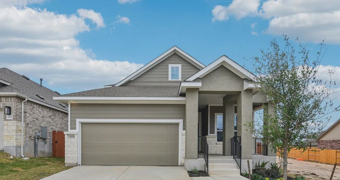 Front exterior of a new home in Meyer Ranch, New Braunfels, TX, highlighting curb appeal (Image 1). Front exterior of a new home in Meyer Ranch, New Braunfels, TX, highlighting curb appeal (Image 1).