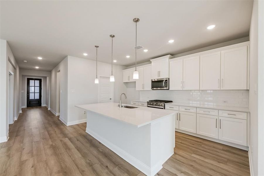 Furnished interior view inside a new home in Arbors at Legacy Hills, Celina (Image 8). Furnished interior view inside a new home in Arbors at Legacy Hills, Celina (Image 8).