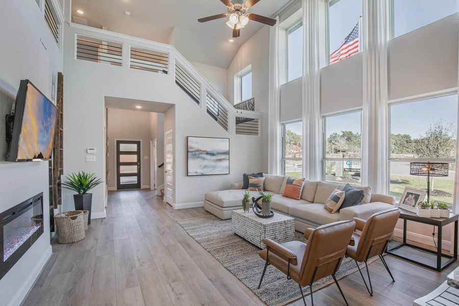 Representative furnished interior of a home built from the Lincoln by Chesmar Homes in Buffalo Crossing, Cibolo (Image 4).