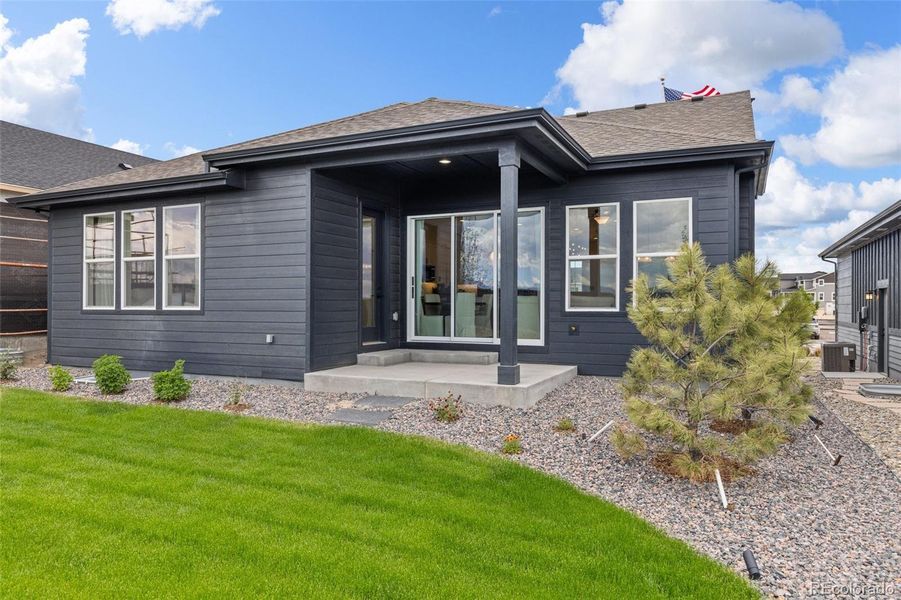 Front exterior of a new home in Sterling Ranch 50s, Colorado Springs, CO, highlighting curb appeal (Image 1). Front exterior of a new home in Sterling Ranch 50s, Colorado Springs, CO, highlighting curb appeal (Image 1).