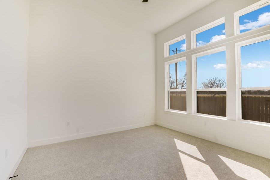 Spacious, unfurnished interior of a new home in South Brook, Leander (Image 8).
