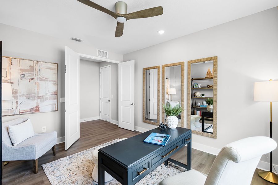 Representative furnished interior of a home built from the Paxton by Hartizen Homes in Eden Crest, Apopka (Image 33).