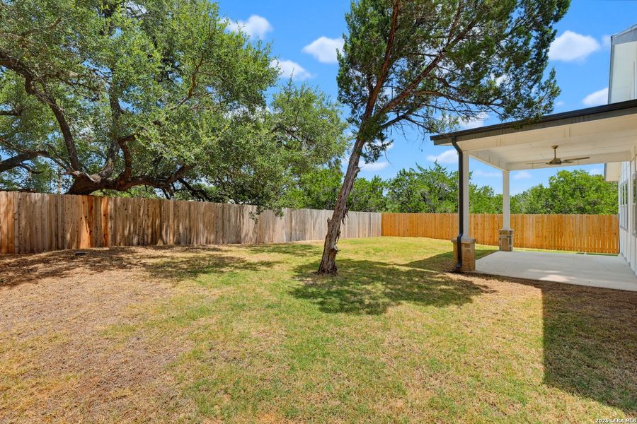 Exterior details and patio area of a home in , Spring Branch (Image 18).