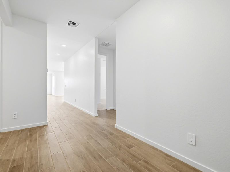 Spacious, unfurnished interior of a new home in White Tank Foothills Signature Series, Waddell (Image 14). Spacious, unfurnished interior of a new home in White Tank Foothills Signature Series, Waddell (Image 14).
