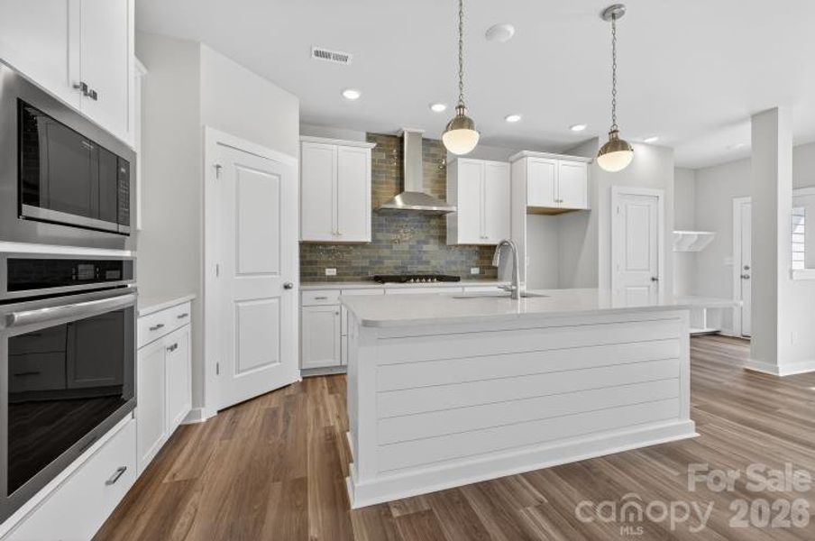 Furnished interior view inside a new home in North Creek Village - Townhomes, Huntersville (Image 7).