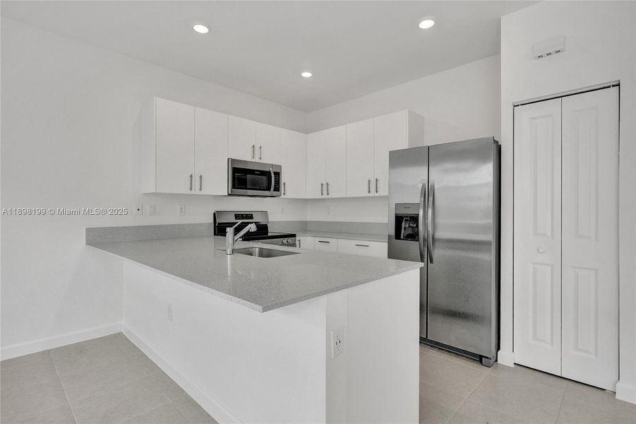 Furnished interior view inside a new home in , Homestead (Image 8). Furnished interior view inside a new home in , Homestead (Image 8).