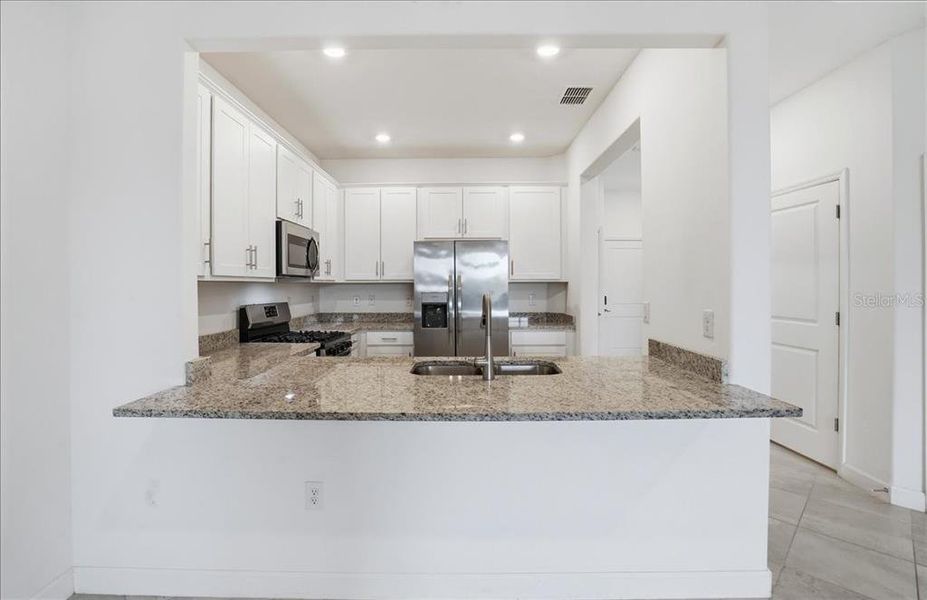 Furnished interior view inside a new home in , Lakewood Ranch (Image 5). Furnished interior view inside a new home in , Lakewood Ranch (Image 5).