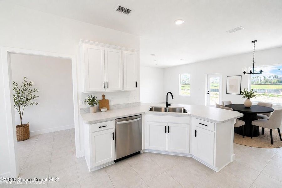 Furnished interior view inside a new home in St. John's Preserve, Palm Bay (Image 8).