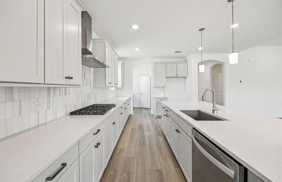 Kitchen featuring a large island ideal for informal dining and gatherings *Real home pictured Kitchen featuring a large island ideal for informal dining and gatherings *Real home pictured