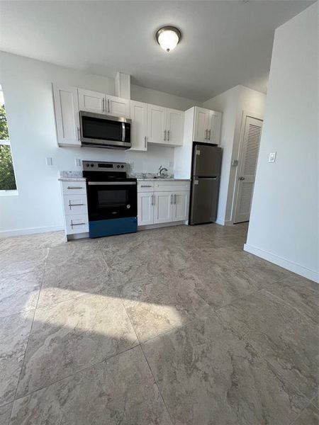 Furnished interior view inside a new home in , Fort Lauderdale (Image 4).