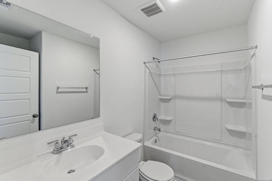 Furnished interior view inside a new home in Cinco Lakes, San Antonio (Image 8).