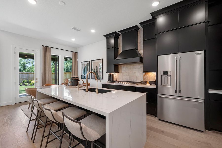 Furnished interior view inside a new home in The Highlands 50', Porter (Image 6).
