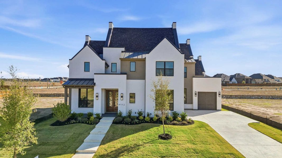 Front exterior of a new home in Mosaic: 70ft. lots, Celina, TX, highlighting curb appeal (Image 1). Front exterior of a new home in Mosaic: 70ft. lots, Celina, TX, highlighting curb appeal (Image 1).