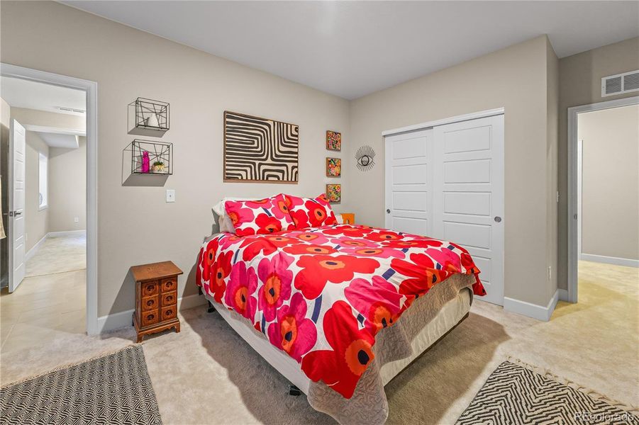 Bedroom: Guest or rental bedroom with closet.