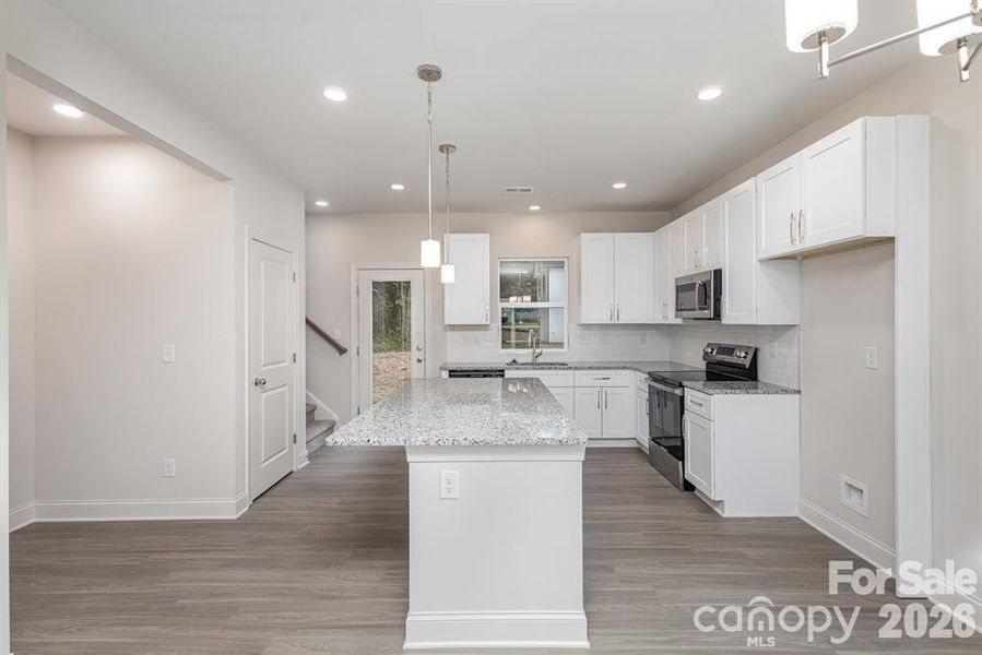 Furnished interior view inside a new home in , Statesville (Image 10).